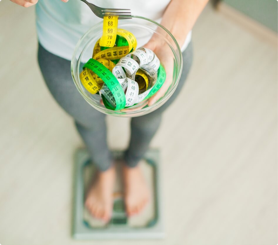 diet-and-weight-loss-woman-holds-bowl-and-fork-wi-2025-02-12-04-48-58-utc (1)