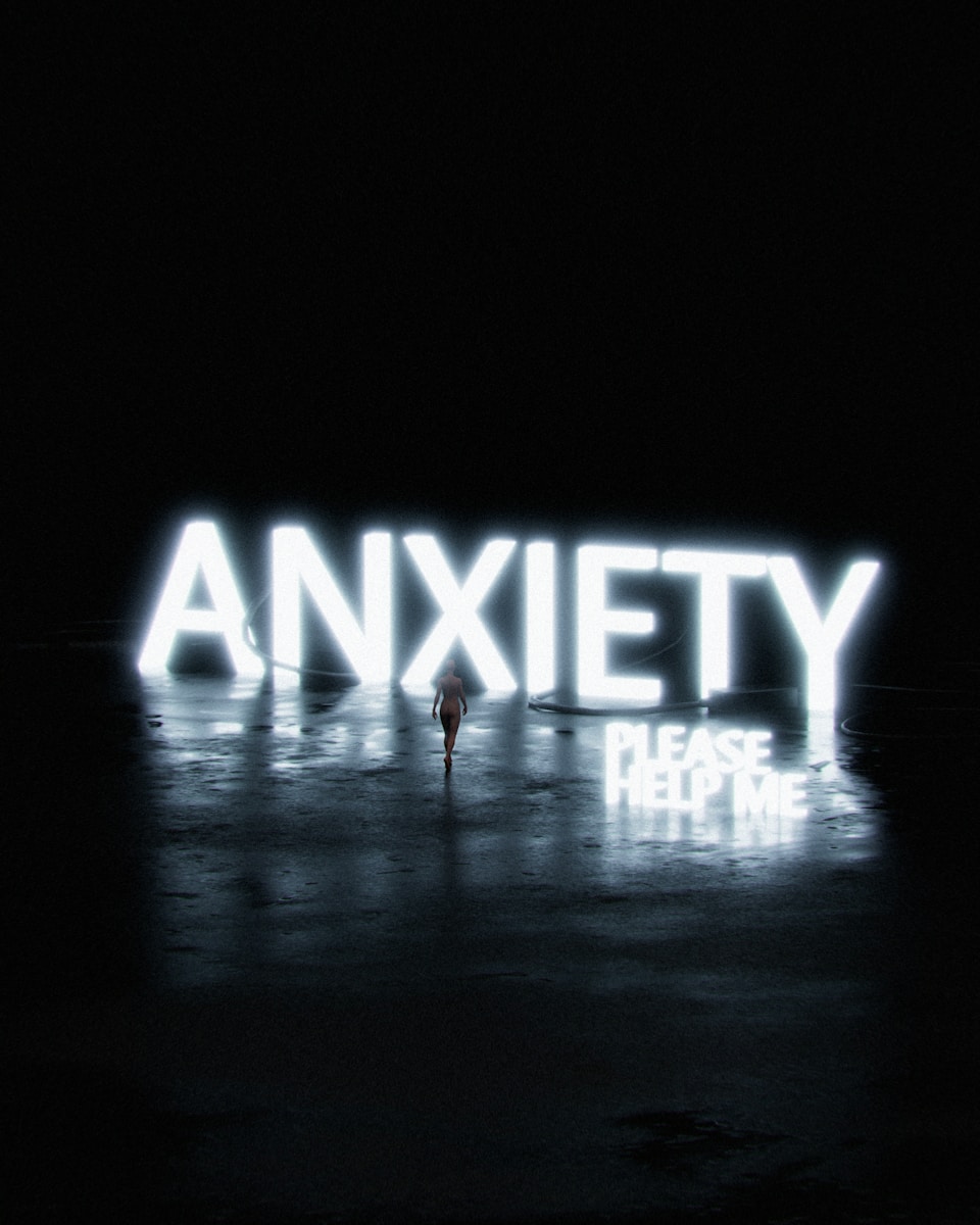The word anxiety illuminated against a dark background.