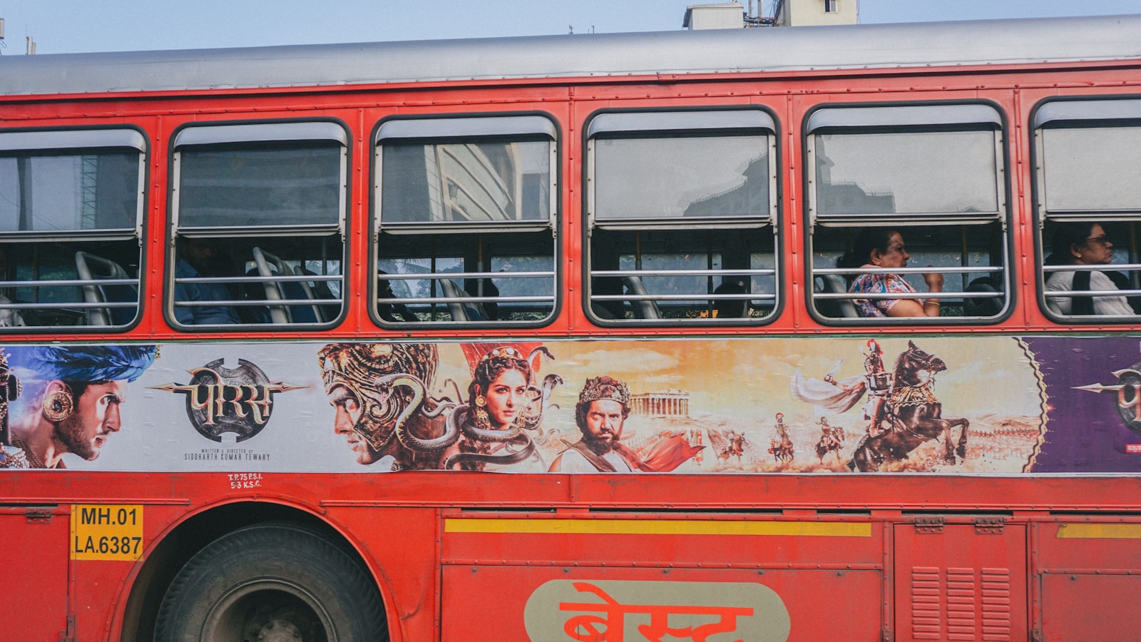 A red bus on a street.