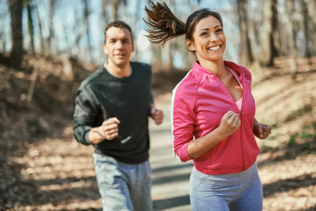 cheerful-couple-jogging-outside-2026-03-13-04-54-57-utc