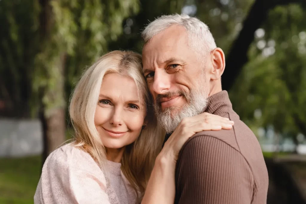 affectionate couple enjoying nature embracing in utc