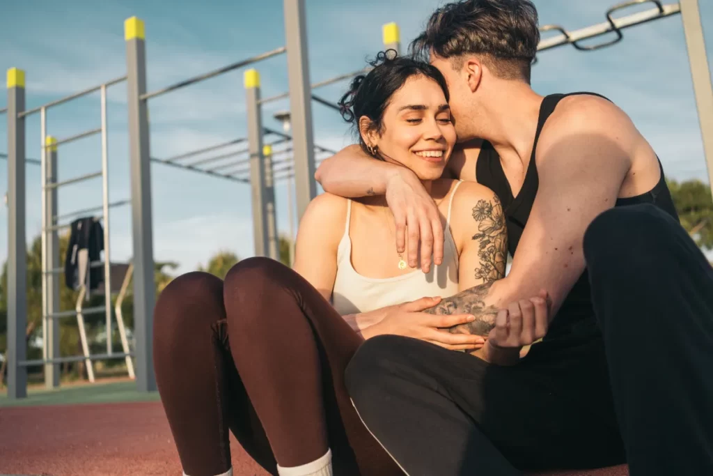 affectionate young couple relaxing after workout o utc
