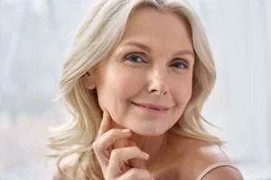 close up portrait of a smiling blond woman utc