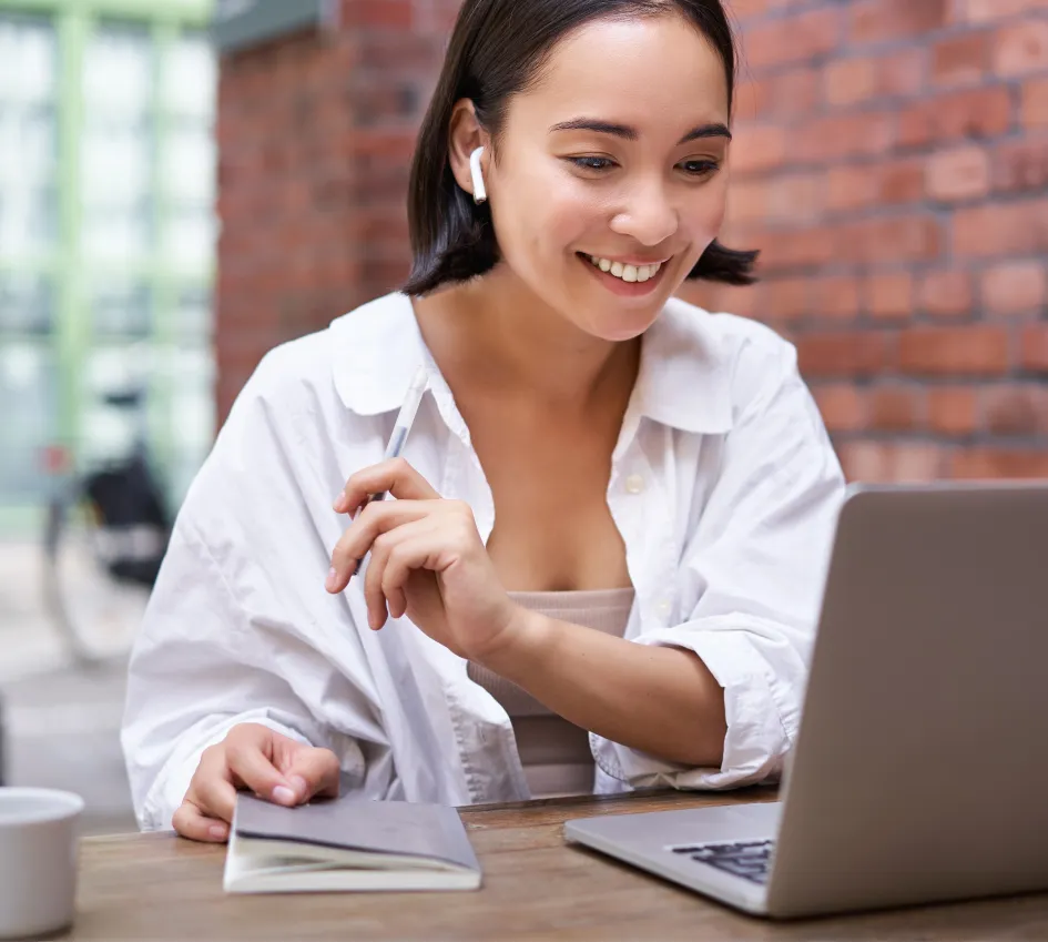 smiling-asian-girl-in-wireless-earphones-looking-2025-03-10-03-29-09-utc