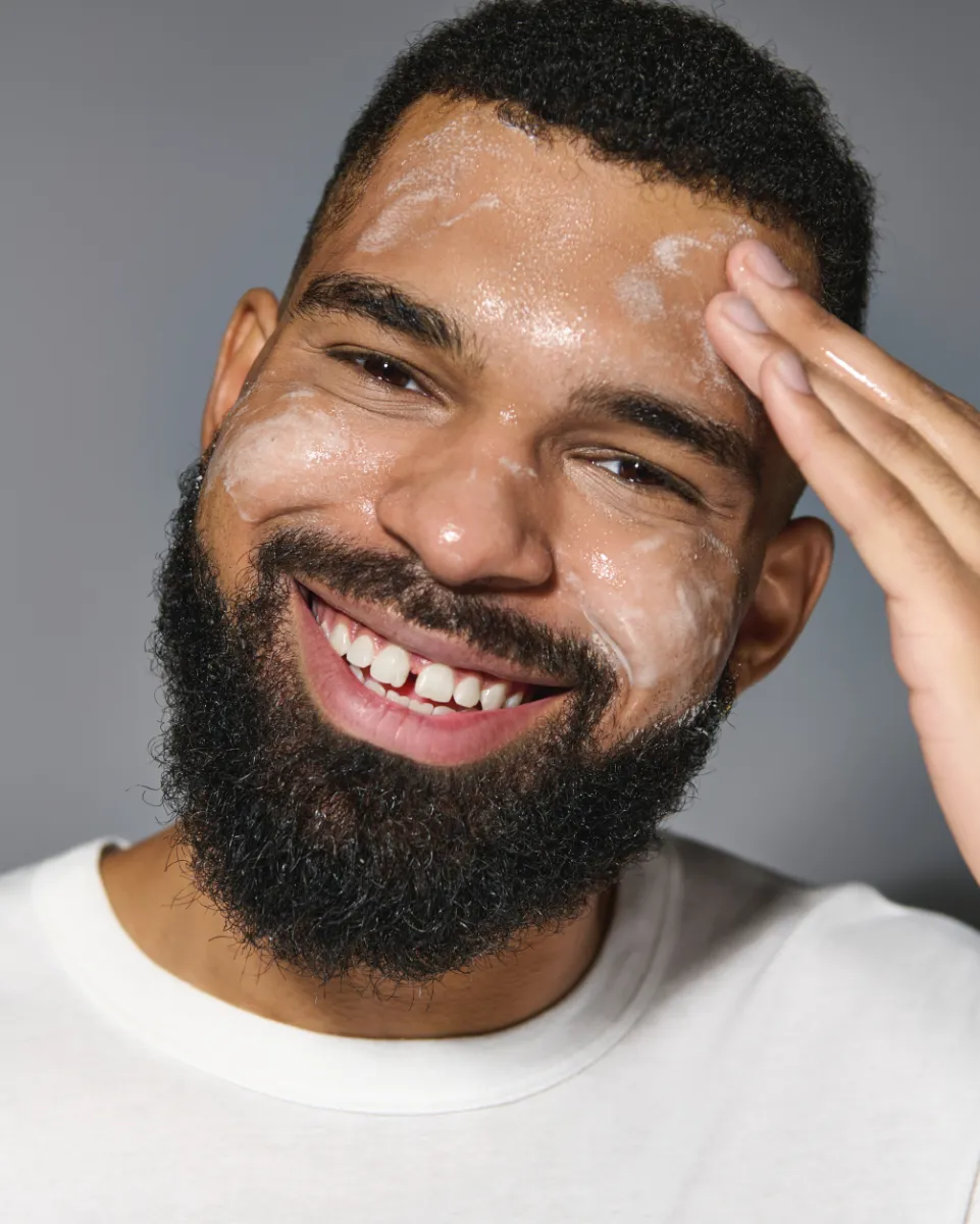 Man cleansing his face