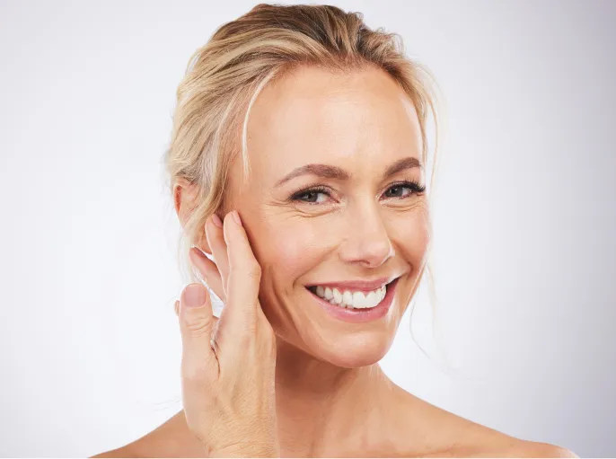 smiling woman posing for a beauty portrait utc
