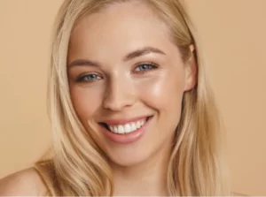 smiling-woman-with-blonde-hair-close-up-portrait-2026-03-19-04-23-51-utc