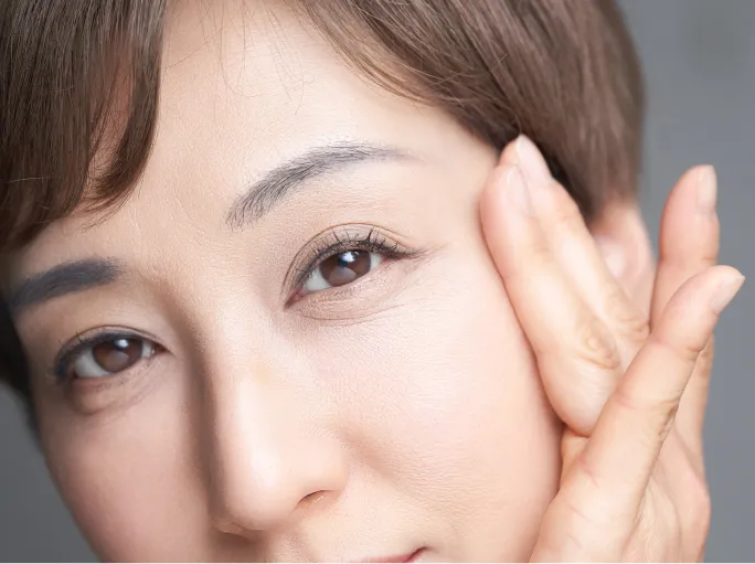 woman posing with hand to face close up utc