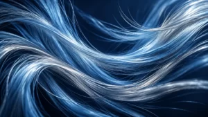 Fine silver and ice-blue fibers curve across a deep-navy background in conceptual hair-texture artwork.