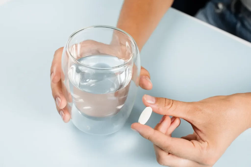 taking medication with water at home utc