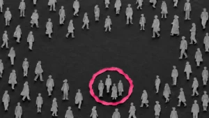 Cut-paper human silhouettes on charcoal gray with a pink circle around a small group.
