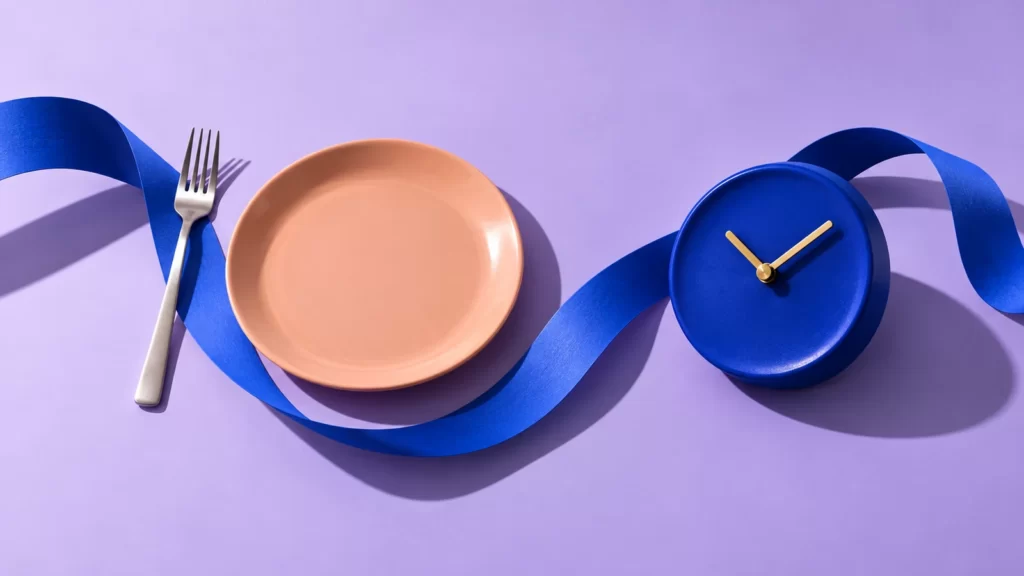 Lavender and peach plate, decorative clock and ribbon shapes.